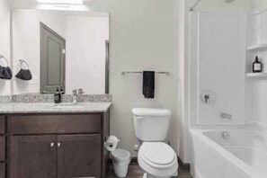 Shower, hair dryer - Luxe King 3BR Suite in North Raleigh! (Raleigh)