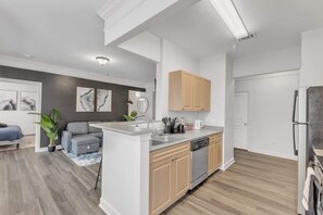 Fridge, microwave, stovetop, cookware/dishes/utensils