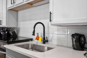 Fridge, microwave, oven, stovetop - Luxe King 2BR Suite in South End Charlotte! (Charlotte)