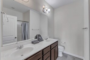 Regadera y secadora de cabello 