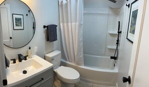 Hair dryer, towels, soap, shampoo