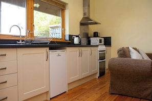 Fridge, microwave, toaster, cookware/dishes/utensils