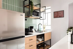 Fridge, microwave, coffee/tea maker, toaster