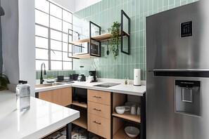 Fridge, microwave, coffee/tea maker, toaster