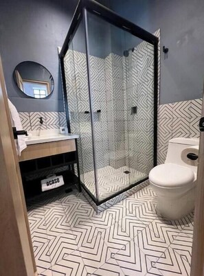 Hair dryer, towels, soap, shampoo