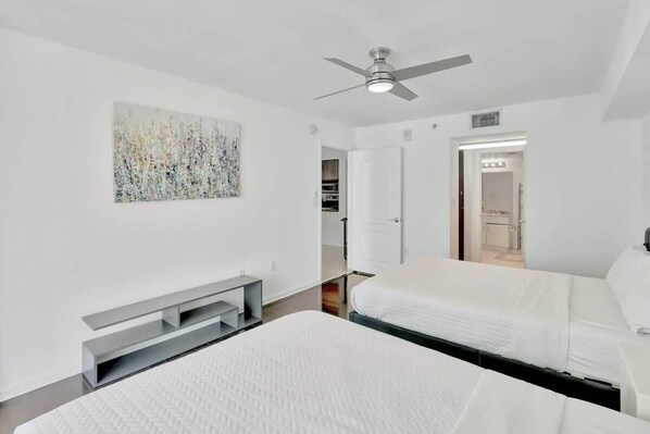 1 bedroom, desk, iron/ironing board, travel cot