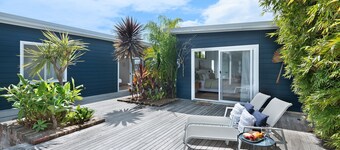 The Manyana Getaway - Spend your days swimming, surfing, or fishing