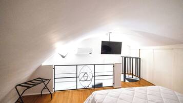 1 dormitorio, caja fuerte, tabla de planchar con plancha y wifi