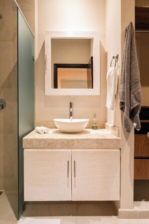 Shower, hair dryer, towels, soap