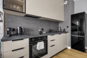 Réfrigérateur, four, plaque de cuisson, lave-vaisselle