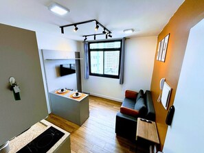 Living area - One bedroom apartment in the center of Curitiba (Centro Curitiba)