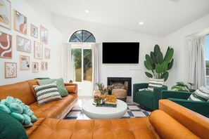 Smart TV, fireplace, foosball, books