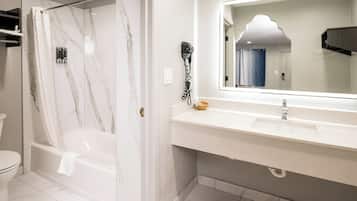 Bathtub, free toiletries, hair dryer, towels