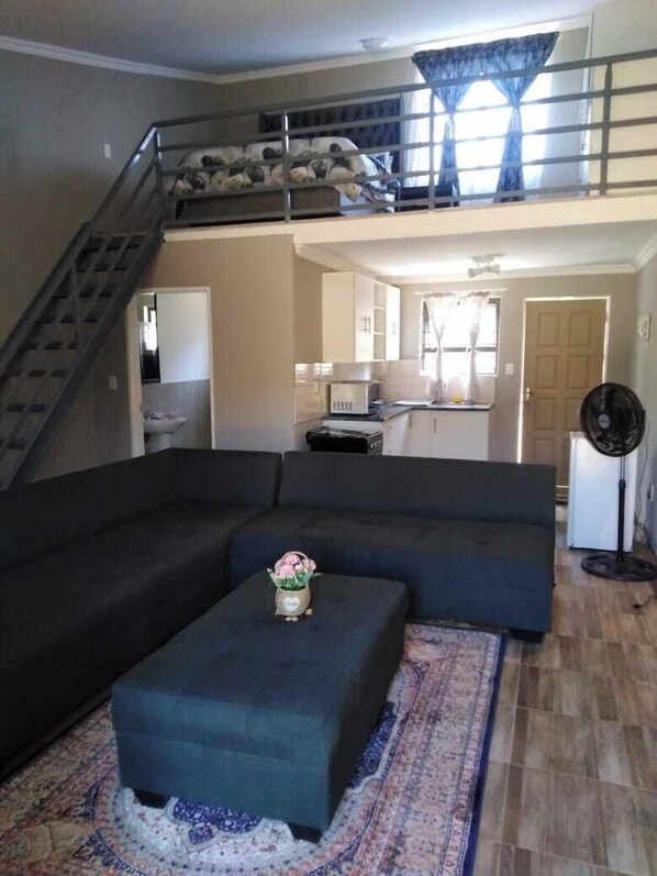 Comfort Apartment, Courtyard View | Living area | 32-inch plasma TV with satellite channels