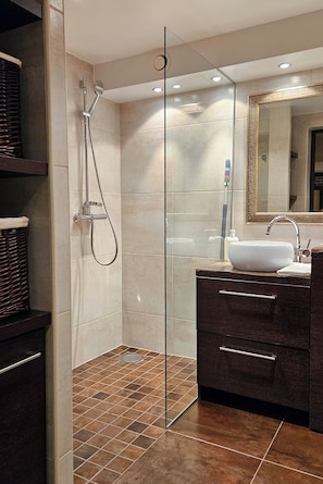 Shower, hair dryer, towels, soap