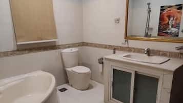 Deluxe Triple Room, City View | Bathroom | Shower, free toiletries, towels, soap