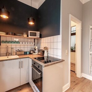 Mikrobølgeovn, ovn og kokeplater