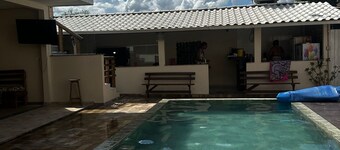 House for relaxation with games area and barbecue