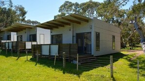 Unclassified image, 3 of 10, button - DE 3 - Deluxe Open Plan Cabin (Cape Otway)