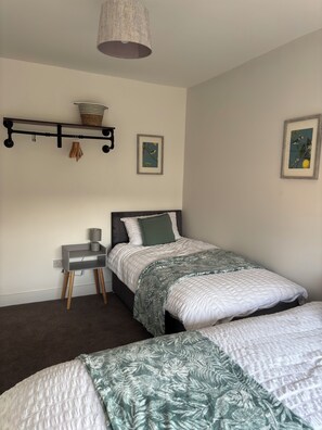 4 bedrooms, desk, iron/ironing board, travel cot