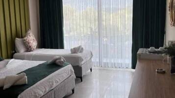 Luxury Studio | Individually decorated, desk, bed sheets