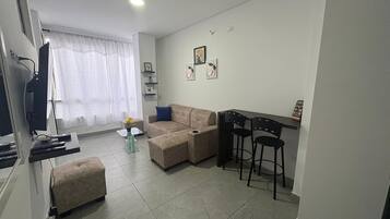 Basic Apartment | Living area | TV, heated floors