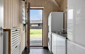 Fridge, stovetop, dishwasher, coffee/tea maker