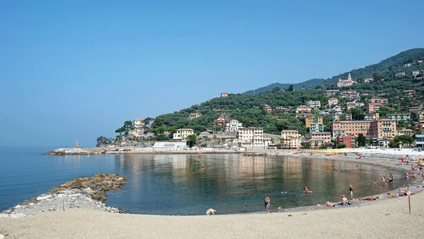 A coastal town with a beach, buildings, and a lighthouse. - Villa 'Chiara' with Mountain View and Private Terrace (Lumarzo)