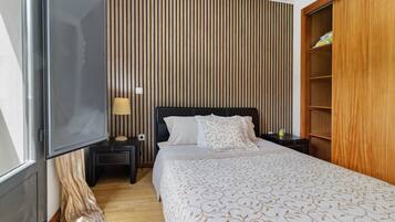 2 dormitorios, tabla de planchar con plancha, wifi gratis y ropa de cama
