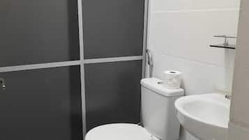 Economy Twin Room | Bathroom | Shower, free toiletries, towels, soap