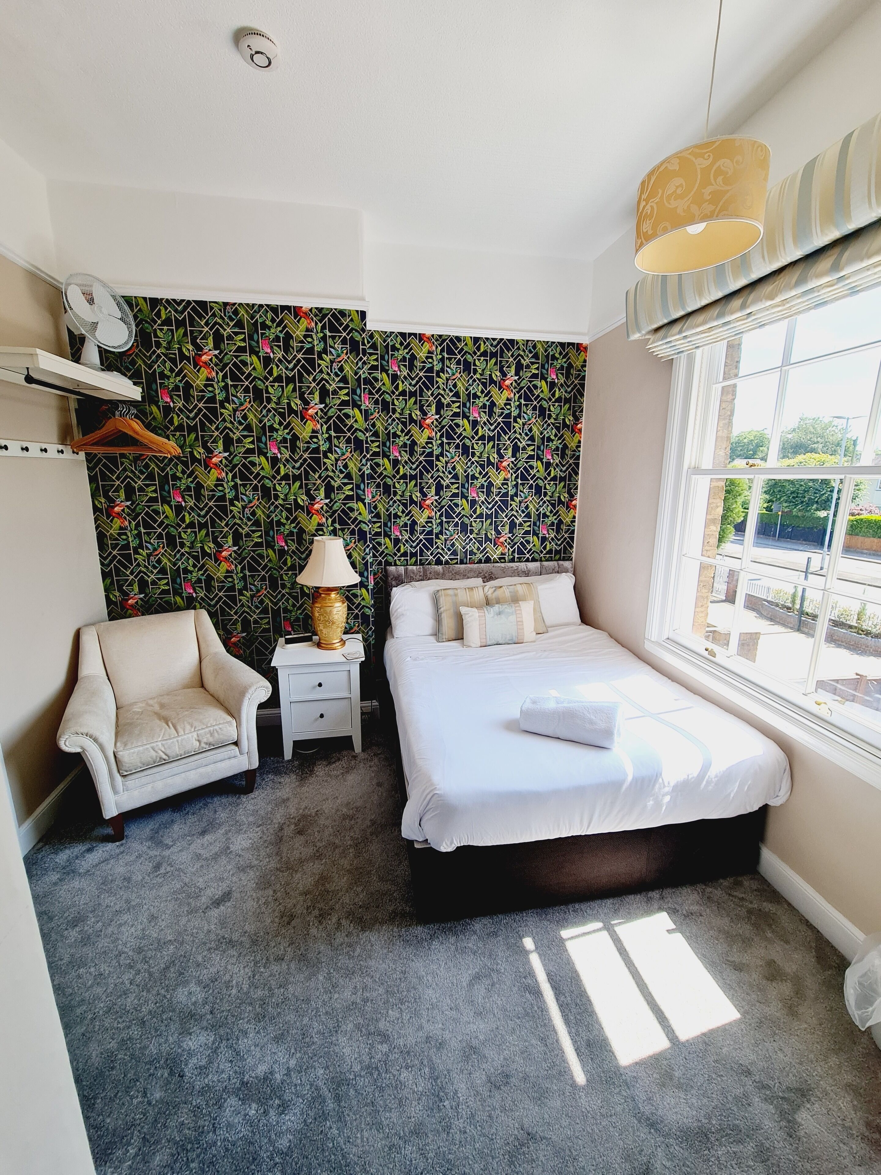 Deluxe Single Room, City View | Living area | TV