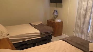 5 slaapkamers, een strijkplank/strijkijzer, beddengoed