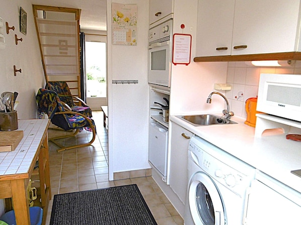 Fridge, microwave, toaster, cookware/dishes/utensils