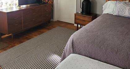 Charming 1-bedroom apt Buffalo WY, on creek, AC, WiFi, & 1 block from downtown.