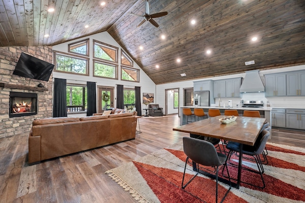 Dining table seats 8 with room for 5 more at the island — perfect for shared meals and laughter.