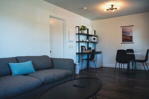 King One Bedroom | Living area | 43-inch Smart TV with cable channels