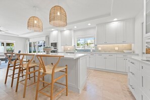 Fridge, microwave, oven, stovetop - Latitude Adjustment hosted by Beach Retreats Vacation Rentals (Holmes Beach)