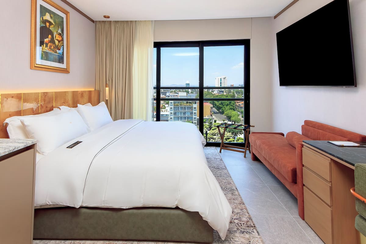 Deluxe Room, City View | Premium bedding, down comforters, pillowtop beds, minibar