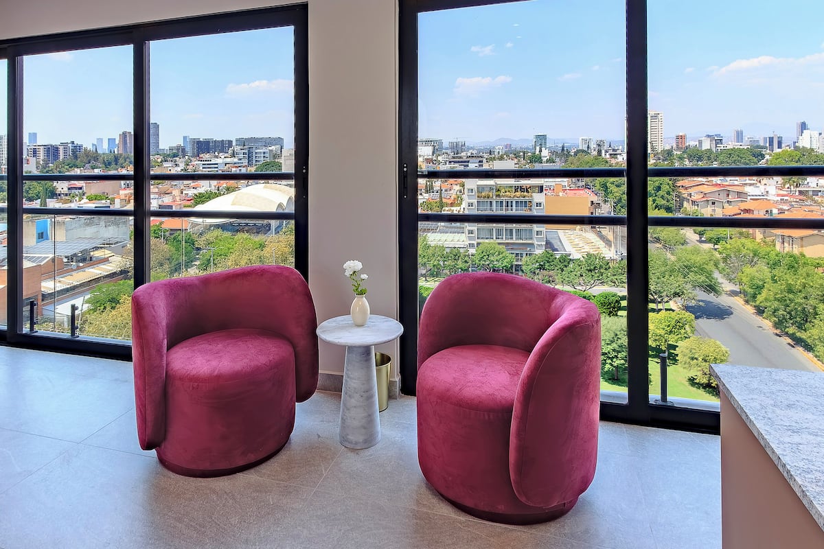 Deluxe Suite, City View | Premium bedding, down comforters, pillowtop beds, minibar