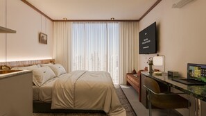 Colchones con pillow-top, minibar y caja de seguridad en la habitación