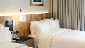 Premium bedding, down duvets, pillow-top beds, minibar
