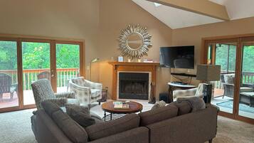 Smart TV, fireplace, DVD player, books