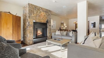 Deluxe Apartment, Mountain View | Living area | 55-inch Smart TV with cable channels