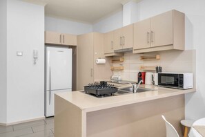 Fridge, microwave, oven, stovetop - Modern Metro | By Host Solutions (Mawson Lakes)