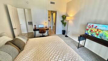 2 bedrooms, desk, iron/ironing board, travel cot