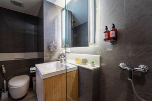 Hair dryer, bidet, towels, soap