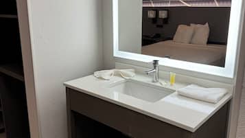 Shower, towels, soap, toilet paper