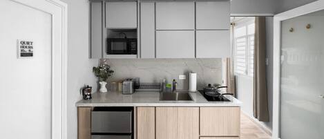 Fridge, microwave, stovetop, coffee/tea maker