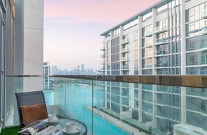 Balcony - Manzil - Stunning 1BR with Lagoon Access (Dubai)