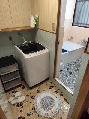 Hair dryer, bidet, towels, soap